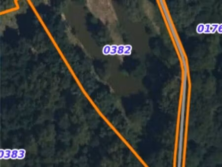 parcelle de 6 000 m² avec étang de 1 800 m²