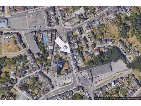 immeuble: commerce + 2 unités d'habitation