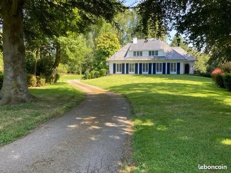 propriété le long de la rivière avec plan d’eau