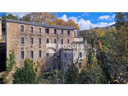 a vendre  proche lodève  ensemble immobilier en pierre d'une