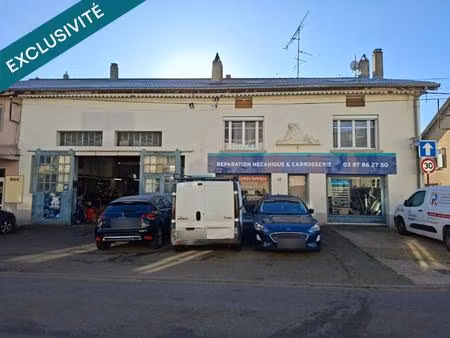 opportunité unique  ensemble immobilier avec garage loué et vaste appartement à réinventer