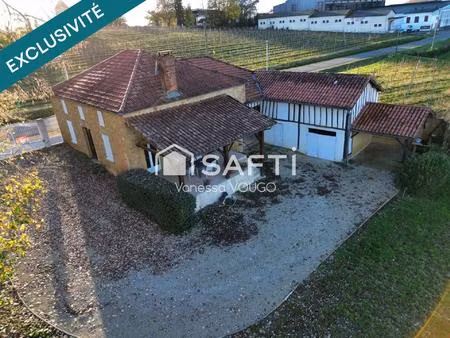 maison de village avec 2 chambres  grande pièce a vivre et dépendances sur un terrain d'en