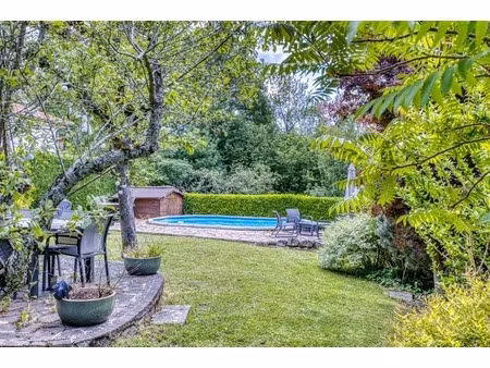 elégante maison familiale avec piscine et vue imprenable sur le jura - 5 pièces echenevex 