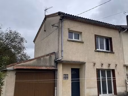 maison rénovée avec garage et jardin