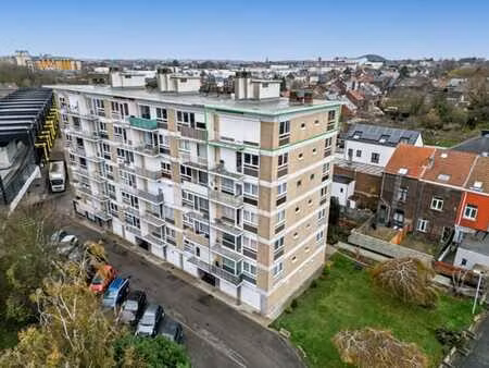 appartement 2 chambres  balcons  cave  garage  jardin commun