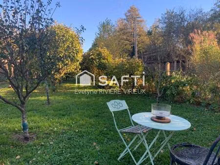 jardin arboré avec accès à la rivière