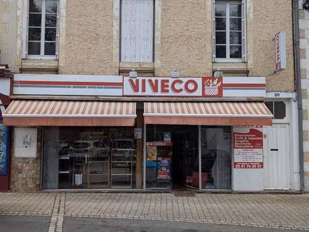 maison avec terrain constructible et commerce