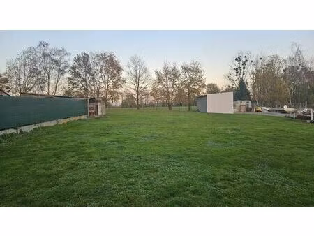 mooie bouwgrond in wellen – landelijk gelegen op wandelafstand van het centrum