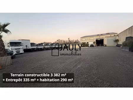 terrain 3 382 m² const. + entrepot + logement f8