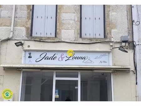 immeuble commerce et habitation