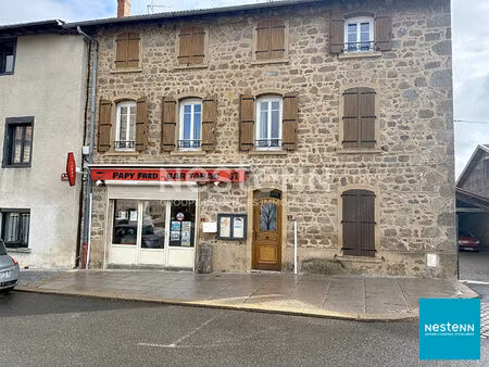 a 15 minutes de feurs  centre haute rivoire bel immeuble en pierre avec local commercial e