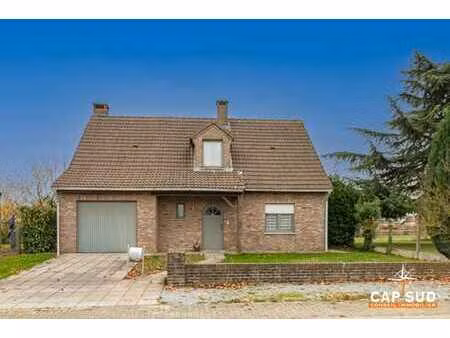 belle maison familiale avec jardin  quartier recherché.