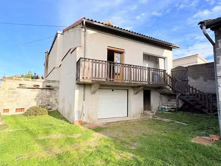 maison avec garage et terrain clos