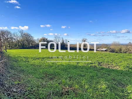 terrain à bâtir - vue dégagée sur la campagne & aperçu lointain sur la mer
