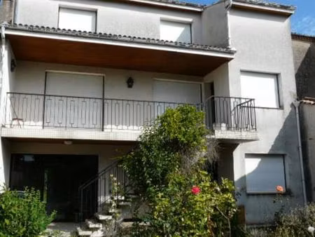 cœur de ville  grande maison jardin garages