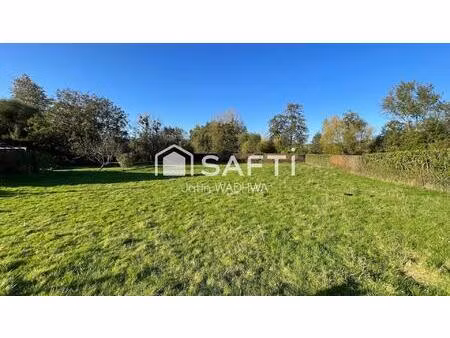 terrain de 1222 m² à renneville  cadre idéal et paisible.