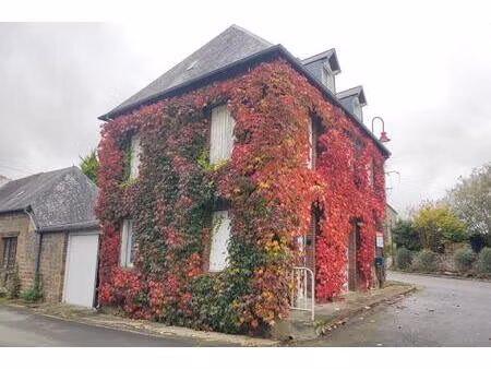 maison de 97m² avec dépendance  au cœur de ce village fleuri
