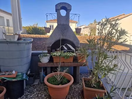 a salindres appartement d'environ 90 m² avec terrasse et garage