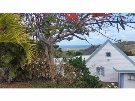 maison t3 en bois de style créole  vue mer