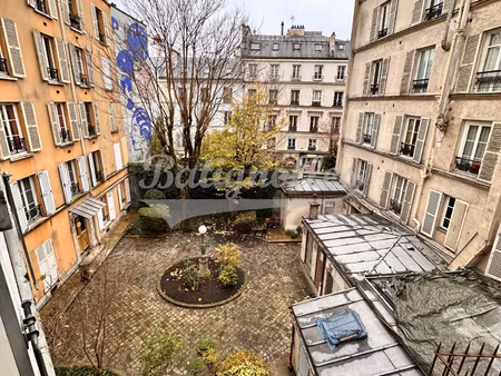 paris xviième.coeur des batignolles. 2 pièces de 26.7 m2