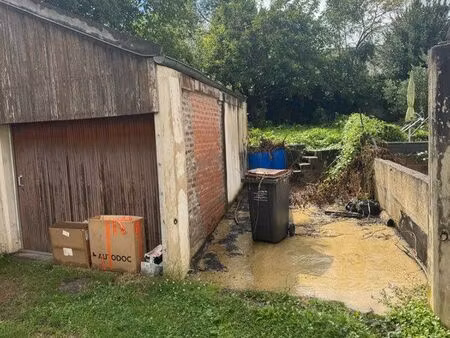 vend garage plus jardin et place de parking