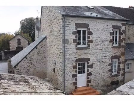 immeuble de rapport 2 appartements + garages+terrain