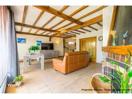 bien contenant une habitation  garage de +/- 84 m² et jardin