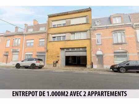 immeuble avec entrepôt de 1.000m2 et 2 appartements !