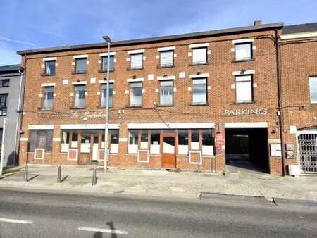 immeuble mixte avec commerce équipé et 4 logements loués – “