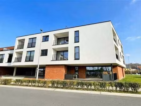 appartement de +- 60 m² bruts + terrasse. parking inclus