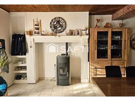 ensemble immobilier compose de trois logements loues