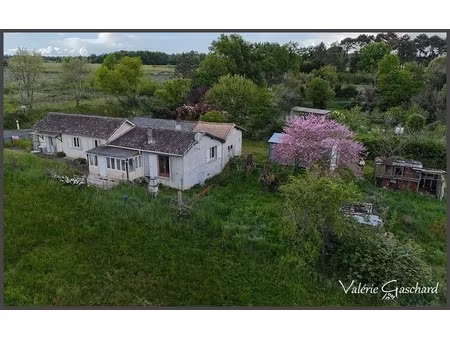 proche st seurin sur l'isle maison 5 pièces + garage  atelier et hangar su 7445 m² de terr