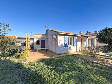 maison 3 faces avec jardin à st genis des fontaines
