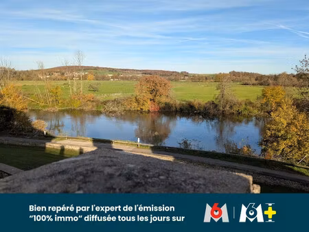 une ancienne cure vue sur la saone où le charme opère dès le seuil…