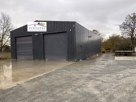 batiment de 400m2 et environ 6500 m2 constructible en zone commercial