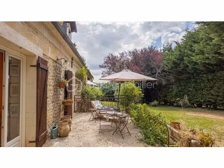 magnifique longère de caractère avec beau terrain  véranda  annexes et grange sur la commu