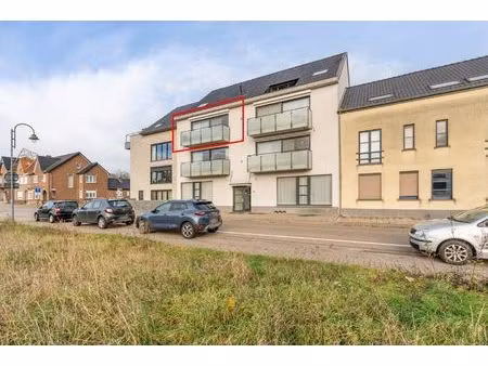 comfortabel investeringsappartement met 2 slaapkamers en garage  in dorpskern