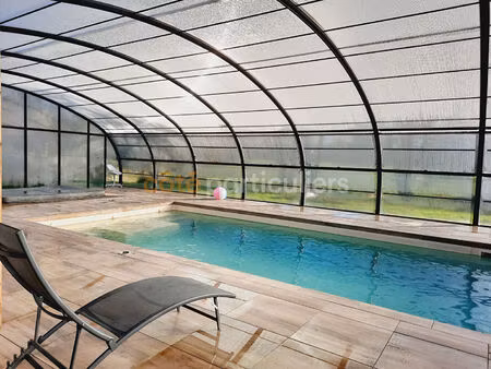 maison de plain-pied à blainville sur mer avec piscine.