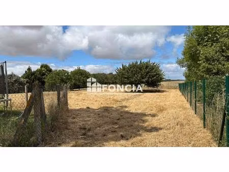 au portes de la rochelle  grand terrain à bâtir