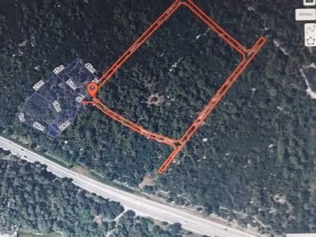 nîmes  terrain de loisirs en zone n  boisé  6500 m²