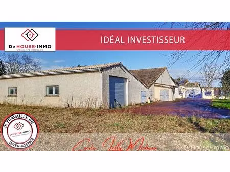 hangar et garage à réhabiliter de 910m²