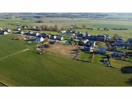 terrain plat – villa 4 façades – façade ±26 m – vue campagne