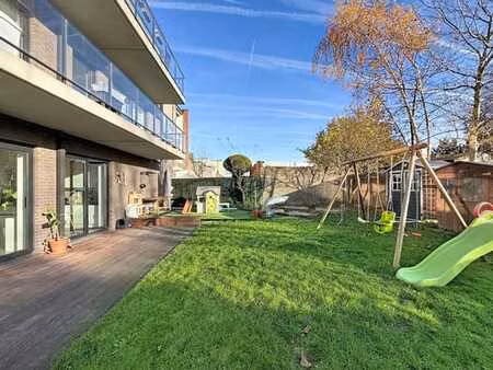 appartement au rdc avec 2 chambres et superbe jardin