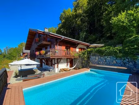 chalet exceptionnel de 7 chambres et 7 salles de bain  situé sur le versant sud de...