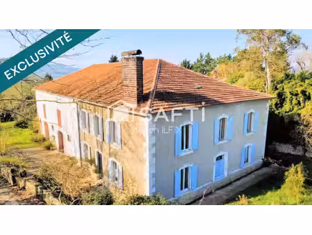 maison de maître de 295 m²  8 chambres  dépendances  terrain arboré de 6338 m²