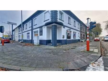 immeuble commerce + habitation