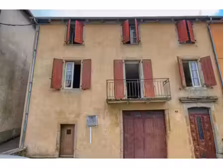 maison de ville 100m2 à rénover à plaisance centre  avec garage et cave.