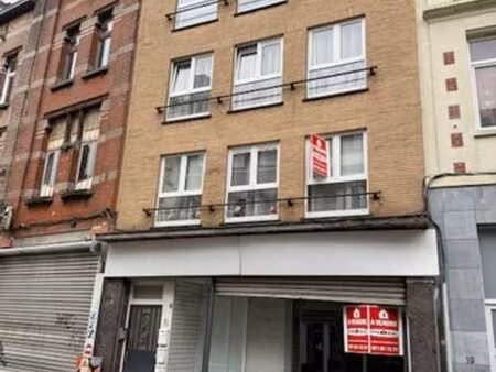 immeuble de rapport comprenant rez commercial et 3 apparteme