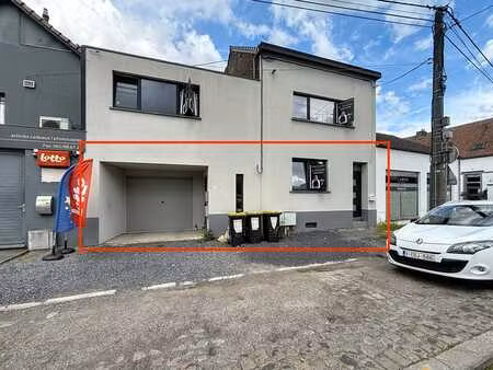 sublime rez-de-chaussée avec garage et jardin à vendre