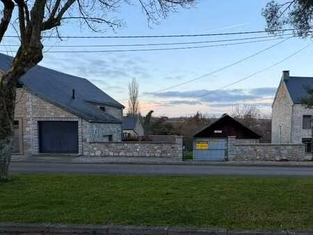 beau grand terrain de 23a 25ca situé au coeur d'evrehailles